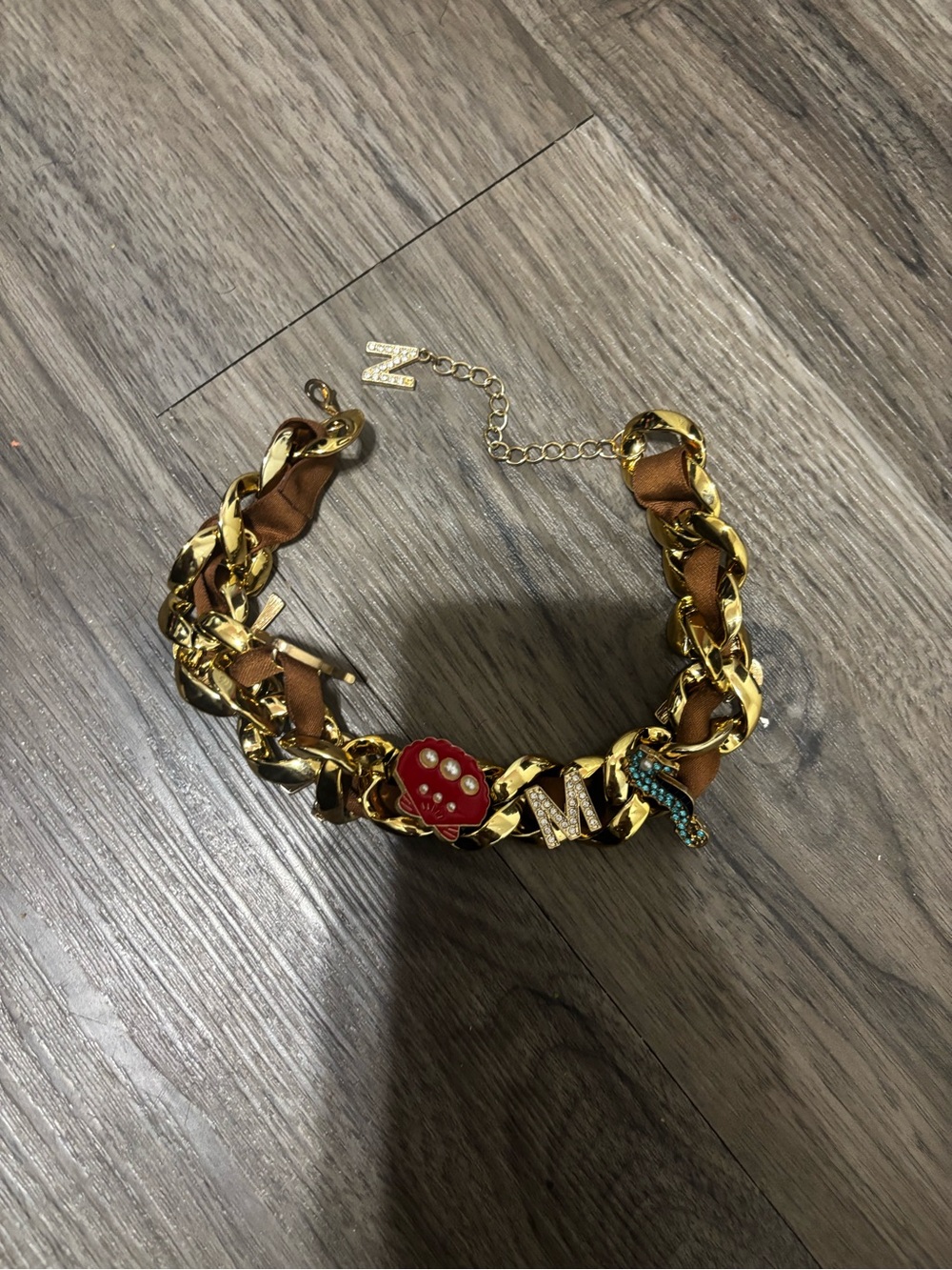 Gold Chain Bracelet with Brown Ribbon and Red Accent Charm